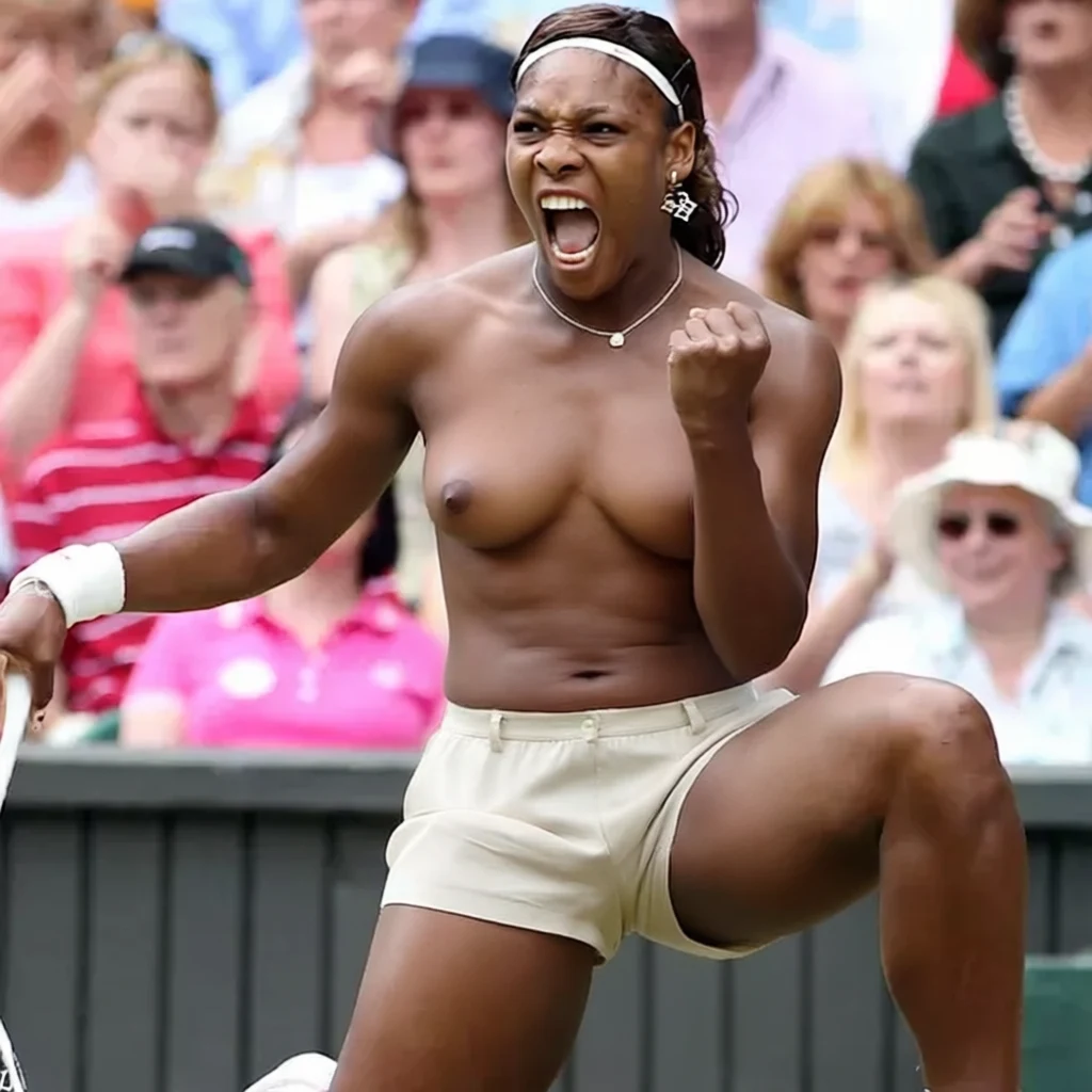 A shirtless female tennis player celebrates victory with a raised fist and open mouth on a court with spectators behind her.